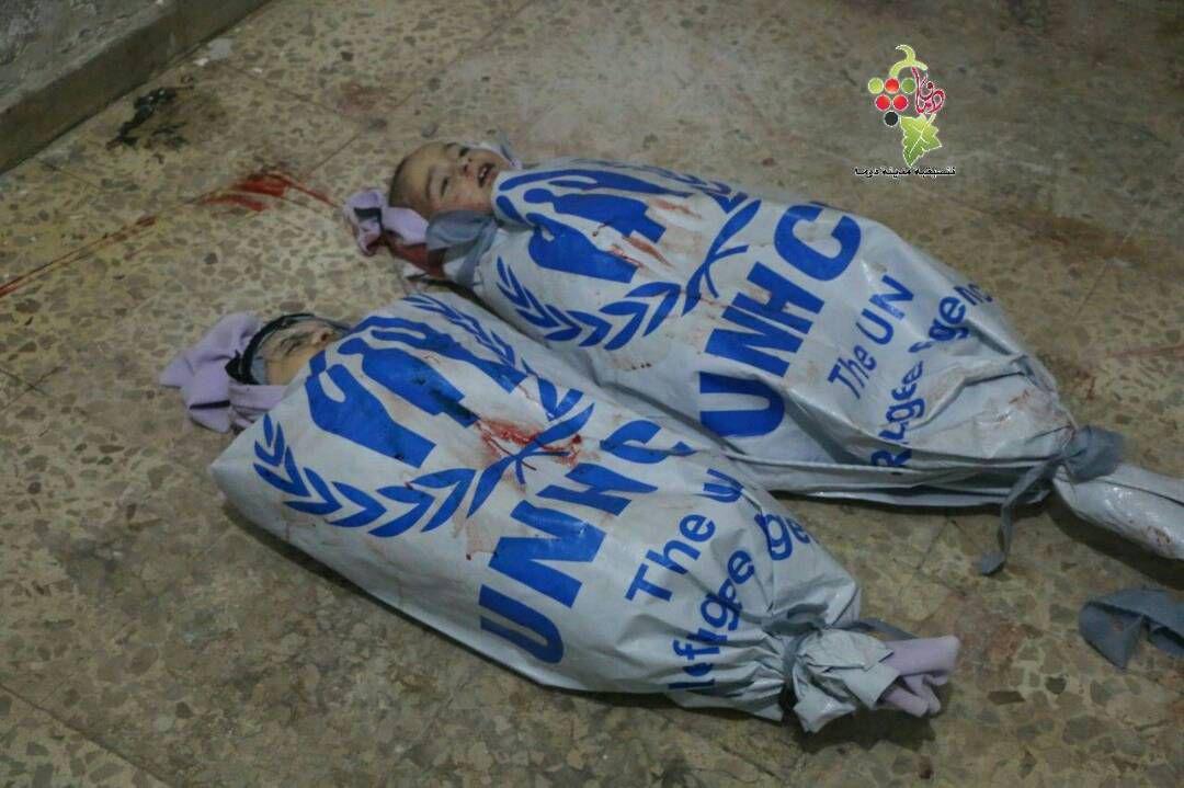 حدث وتعليق - أكفان الشهداء في الغوطة